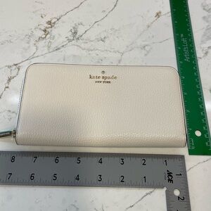 Kate spade zip wallet off white parchment